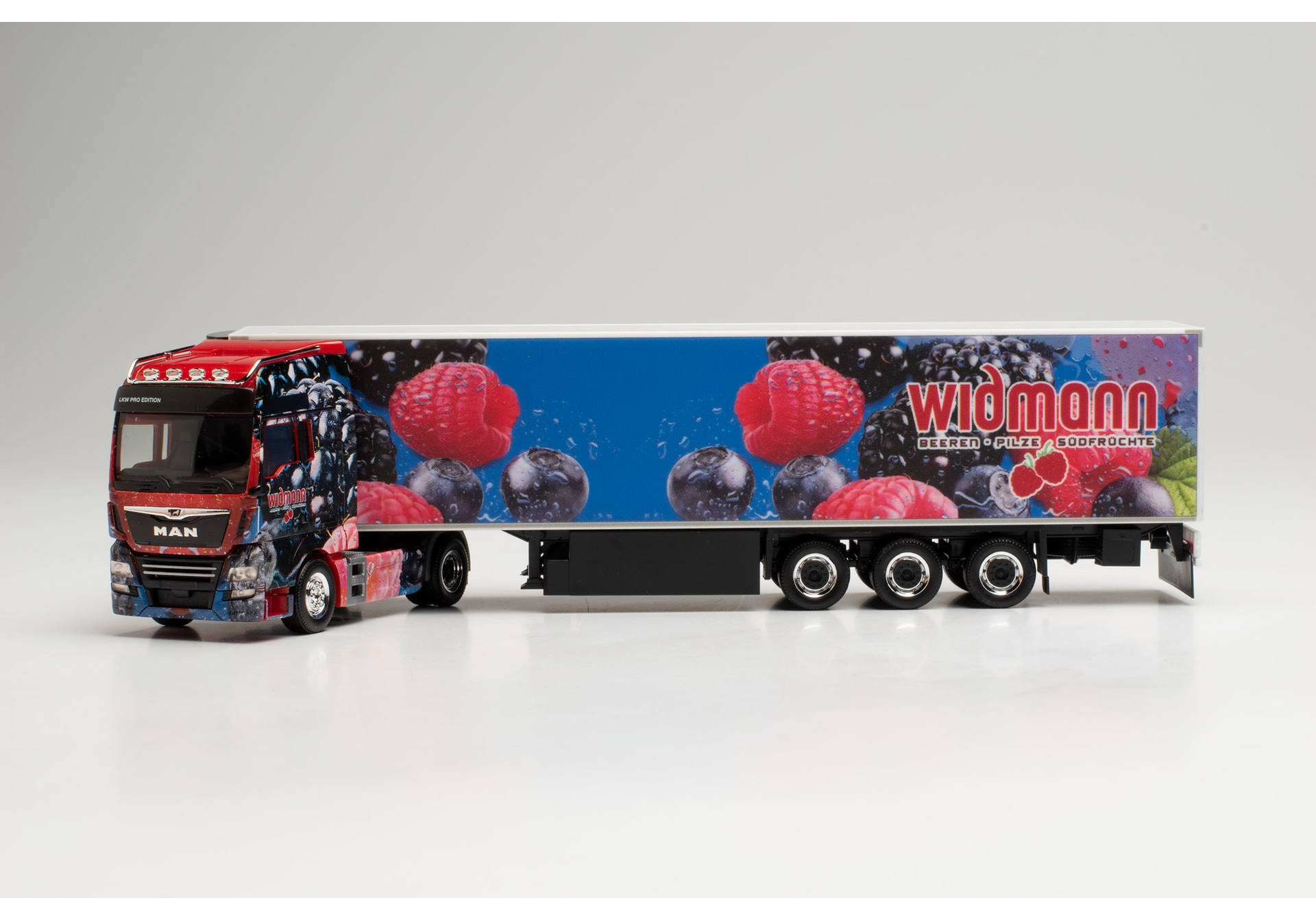 MAN TGX XXL Euro 6 refrigerated semitrailer „Früchte Widmann“