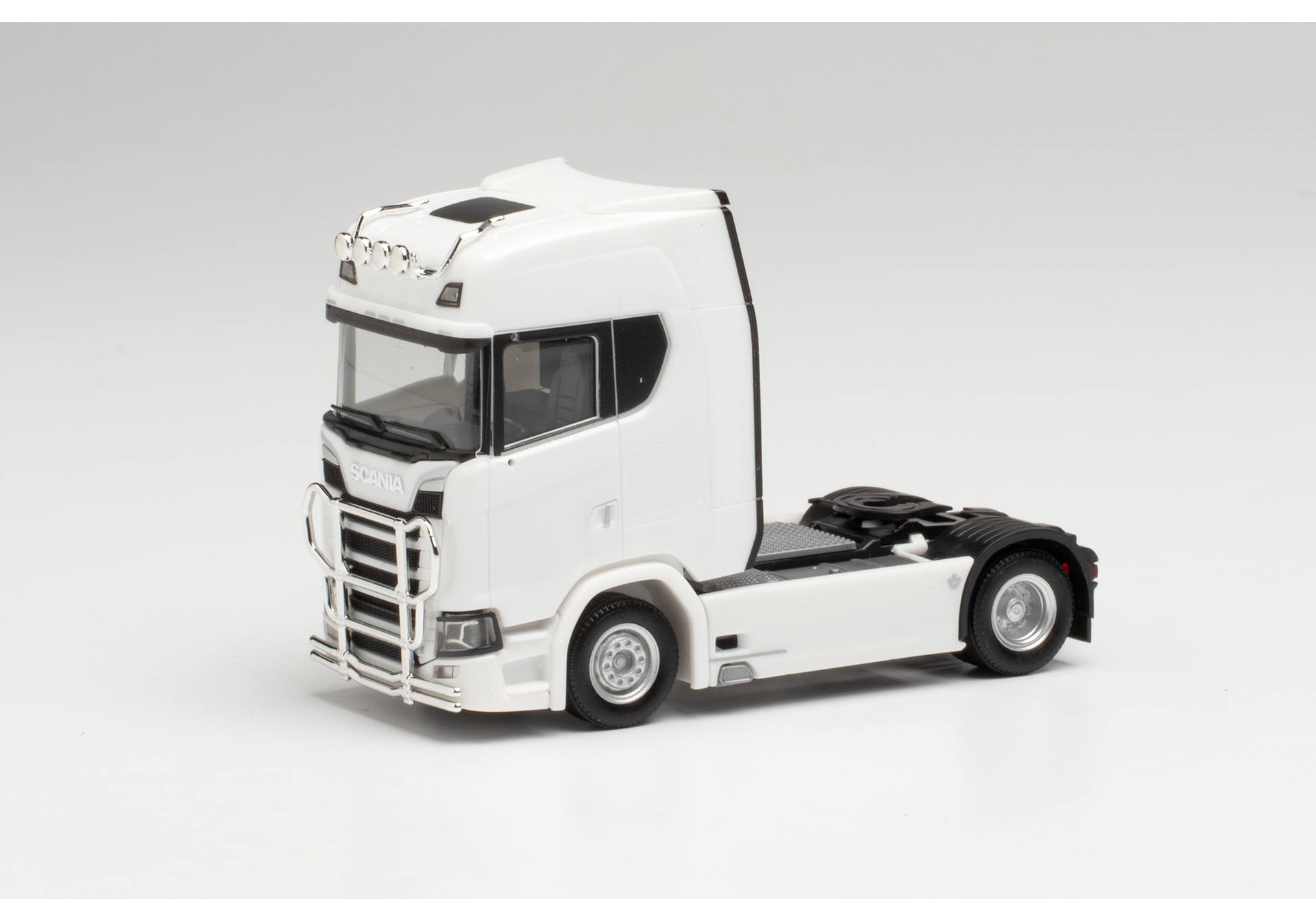 Scania CS 20 high-roof tractor with light bar and bumper, white