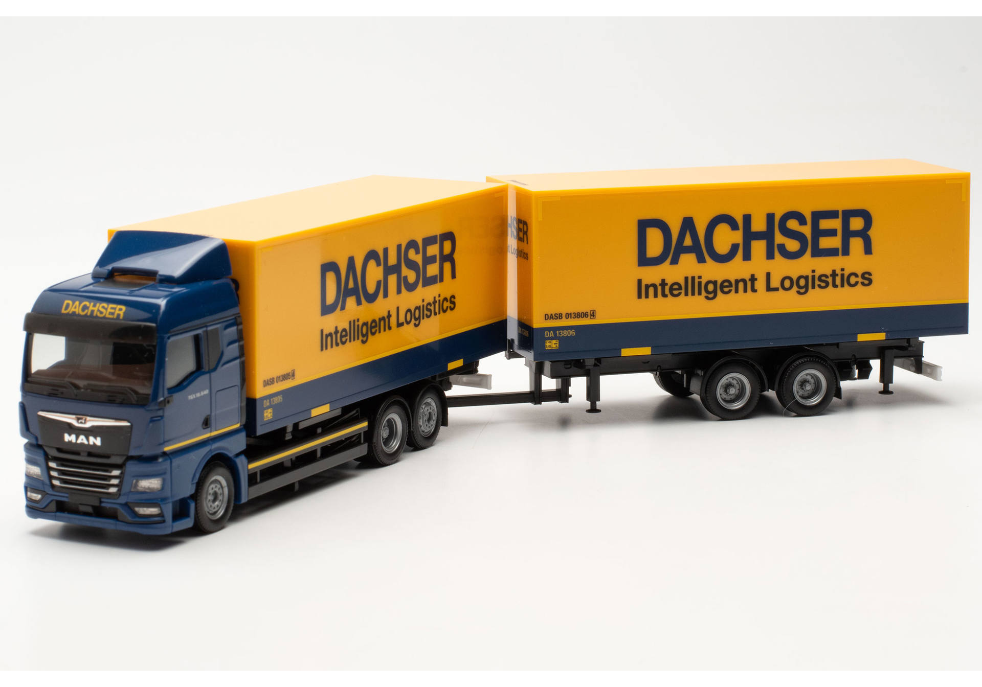 MAN TGX GM interchangeable tandem box trailer "Dachser"