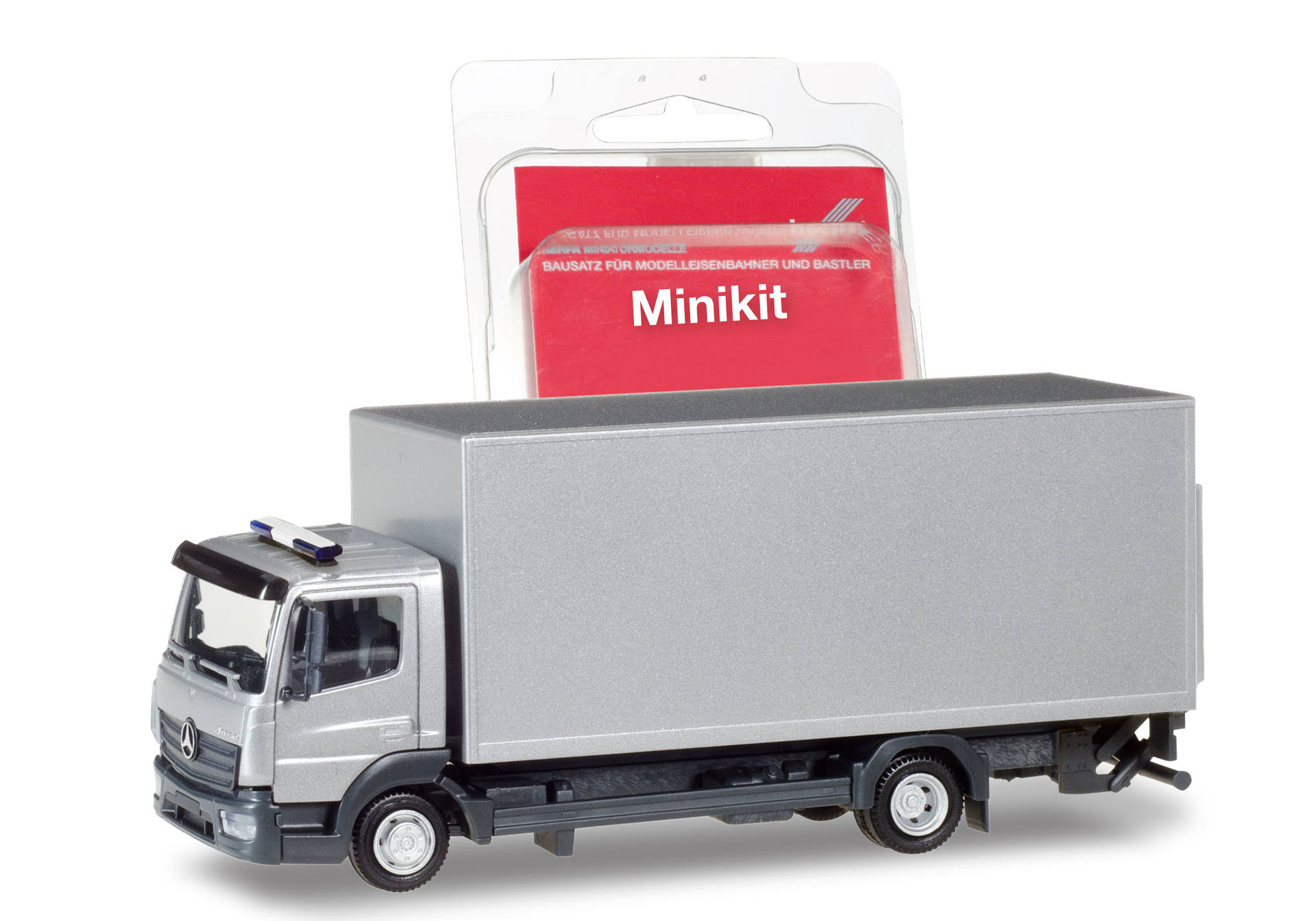 Herpa MiniKit: Mercedes-Benz Atego Koffer-LKW mit Ladebordwand, silber